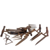 A collection of Antique hop working tools, including a six pronged swivelled hop sampler,
