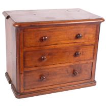 A mahogany table-top chest of 3 long drawers, H33cm, L40cm, D25cm, chest appears to have been