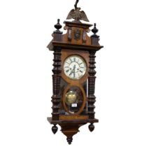 A Victorian wall-mounted Vienna regulator clock, 8-day movement, ornate Black Forest style eagle