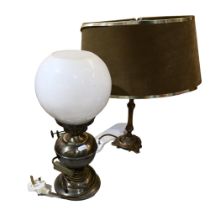 A gilt-metal 2-branch table lamp and shade, H49cm, and an oil lamp table lamp converted to electric,