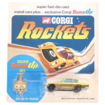A Corgi Rockets - 901 Aston Martin DB6, diecast vehicle with gold plated body, gold tune-up key,