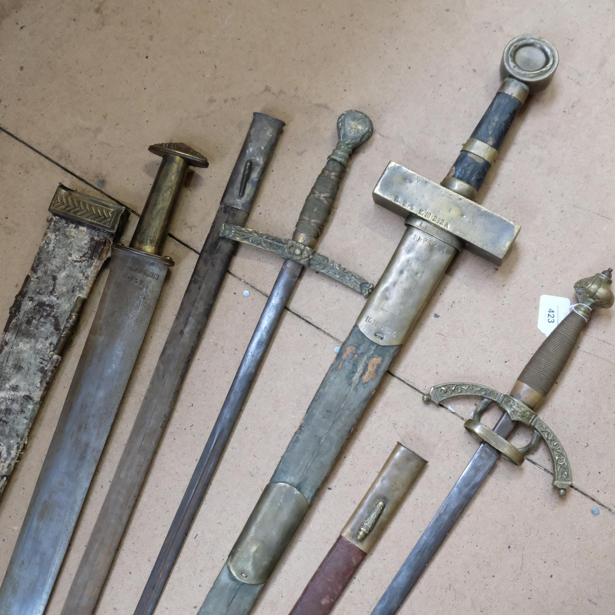 A group of 4 brass European re-enactment or reproduction swords, largest length 110cm - Image 2 of 2