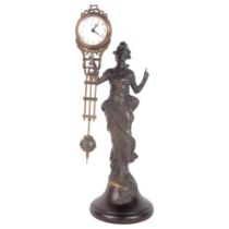 An Art Nouveau style bronze figural mystery clock, H34cm