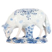 Delft blue and white pottery grazing sheep, length 20cm, height 14.5cm Possibly professionally