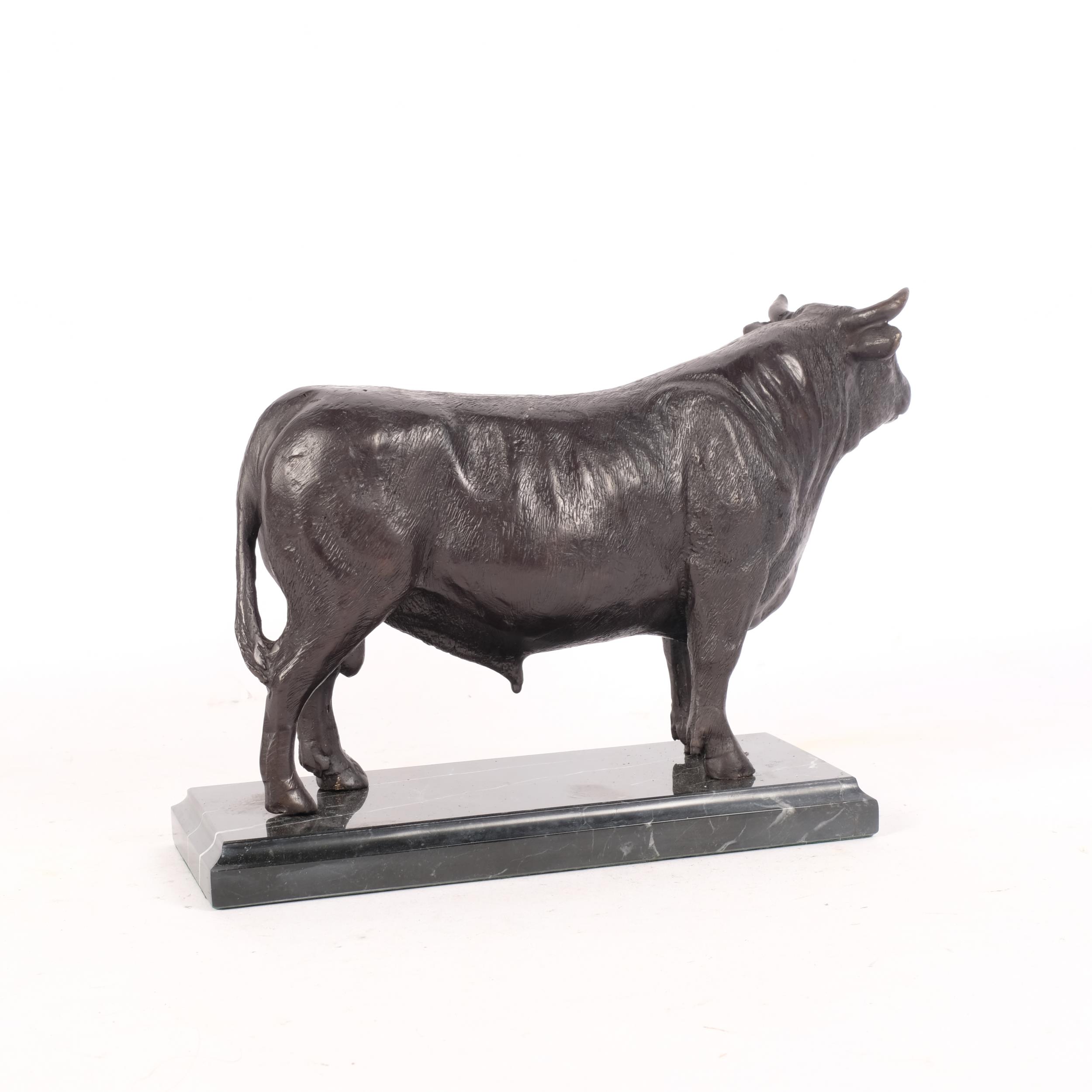 A bronze sculpture of a bull, on a marbled base, H17cm - Image 2 of 2