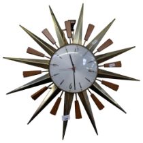 A mid-century Metamec starburst clock, with quartz movement, W60cm, currently not in working order