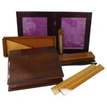 An early 20th century boxwood rule set and divider, leather desk blotter, cubed marquetry pen box