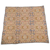 A beautifully embroidered hand-stitched throw, with floral decorated panels, fantastic vibrant