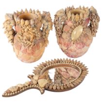A pair of shell-encrusted Antique pottery vases, H22.5cm, and a hand mirror decorated with shells