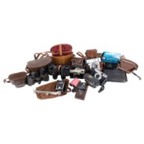 A quantity of Vintage cameras, binoculars and associated accessories, various makes including a