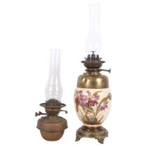 An ornate oil lamp fitting, with brass stand and ceramic body, floral decoration, H60cm, and a