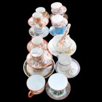 A group of Oriental porcelain decorative cups and saucers, etc
