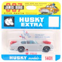 A Husky Extra, model no. 1401, James Bond 007 Aston Martin vehicle, with ejector seat and associated