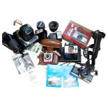 A quantity of Vintage cameras and equipment, including various Carl Zeiss Jena and Hanimex lenses, a