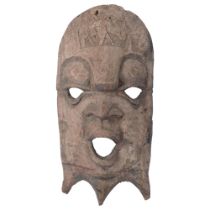 A Tefa carved wood face mask, 51cm