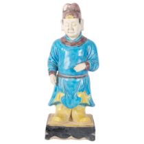 A Chinese stoneware figure, with robins egg blue glaze, 48cm