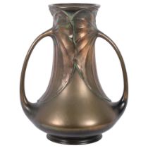 A large stylised Art Nouveau bronze 2-handled vase, with gathered lotus leaf design sign, possibly