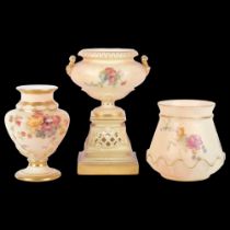 A Royal Worcester Blush Ivory urn-shaped vase, on pierced pedestal base, decorated with sprays of
