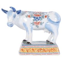 Delft faience polychrome glaze pottery cow, length 20cm, base length 14cm 1 ear broken and re-glued,