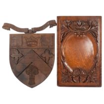 An oak carved coat of arms for Clifton College, L39cm, and an Antique oak panel with applied