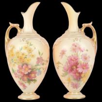 A pair of Royal Worcester Blush Ivory ewers, decorated with sprays of flowers, shape no. 1745,