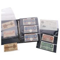 An album of United Kingdom banknotes, including 2 white £5 notes, £1 notes from circa 1930, 1940,
