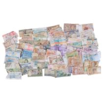 A collection of worldwide banknotes, including Central Bank of Kuwait, Jamaica, Turkey etc