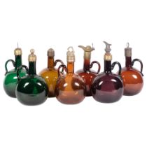 A group of 7 x 19th century blown glass Claret jugs, with various metal mounts, tallest amethyst