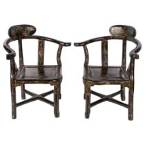 A pair of Chinese black lacquered painted and gilded children's corner armchairs, H46cm