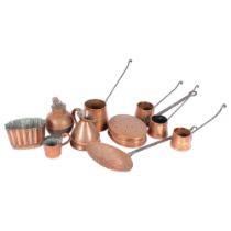 A graduated set of copper cider ladles, a copper jelly mould, marked CM450, an unmarked copper water