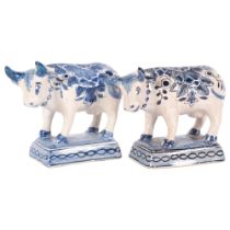 Pair of Delft blue and white pottery cows, length 10cm 1 has probably professionally restored horns