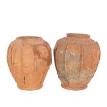 2 similar terracotta vases, with moulded figure panels, 21.5cm