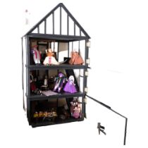 An impressive hand-built Tudor style doll's house, over 3 floors, and including associated doll's