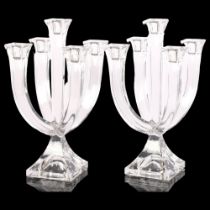 A pair of 5-armed lead crystal candlesticks, designed by Marc Aurel for Nachtmann, marked to the