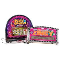 2 illuminated amusement machine tops, for Party Games and Skill Ball Zingy, widest 57cm