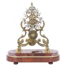 An 8-day brass skeleton clock, with single fusee movement, silver chapter ring and Roman numerals,