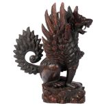 A Balinese carved wood dragon, with traces of paint and gilding, H39cm