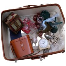 A suitcase containing kitchen scale and weights, clock, binoculars, glassware and a jewellery