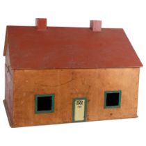 A scratch-built 1980s style wooden doll's house bungalow, no associated furniture, H45cm, L61cm,