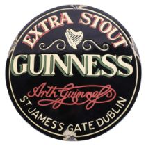 A reproduction enamel Guinness advertising sign, 29cm