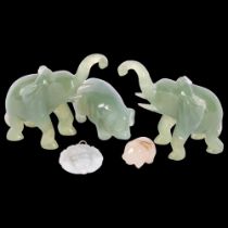 A pair of carved jade elephants, 2 pigs, largest length 7cm, and a Buddha pendant
