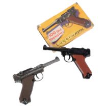 A 100 shot repeater Luger cap pistol, boxed and another worn example (2)