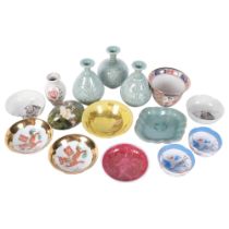 A painted jade egg, a set of 3 vases, various tea bowls