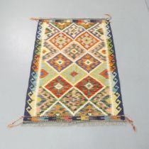 A Chobi Kilim rug. 120x84cm.