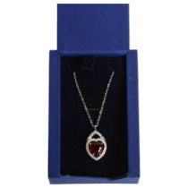SWAROVSKI - a crystal and coloured gem set heart-shaped pendant and chain, boxed
