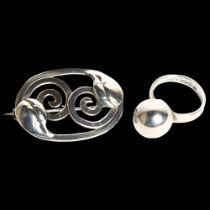 ISAAC COHEN - a stylised silver ring, and a stylised Danish silver brooch (2)