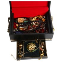Various silver and gilt-metal costume jewellery, brooches, etc, in a small black leather jewellery
