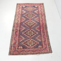 A red-ground Quashqai rug. 183x96cm.