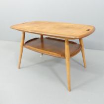 ERCOL - A mid-century elm model 457 Butler's tray two-tier coffee table. With maker's label.