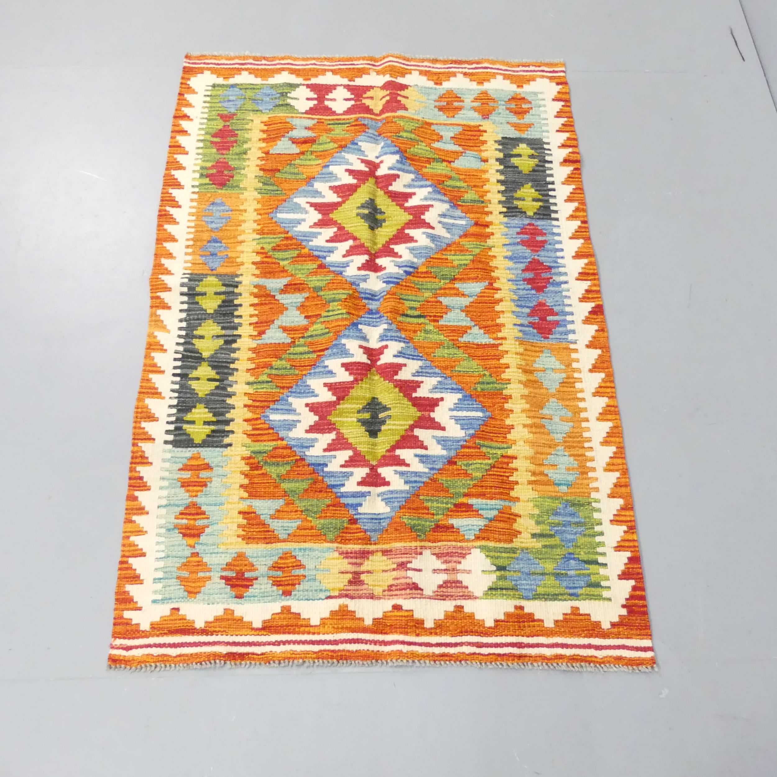 A Chobi Kilim rug. 124x82cm.